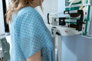 adjusted body weight calculator – healthcare professional reviewing patient weight and clinical data