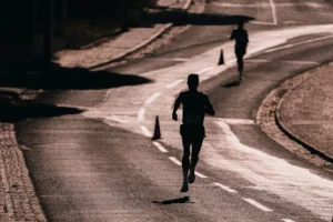 Runner in a marathon race — calories burned running a marathon