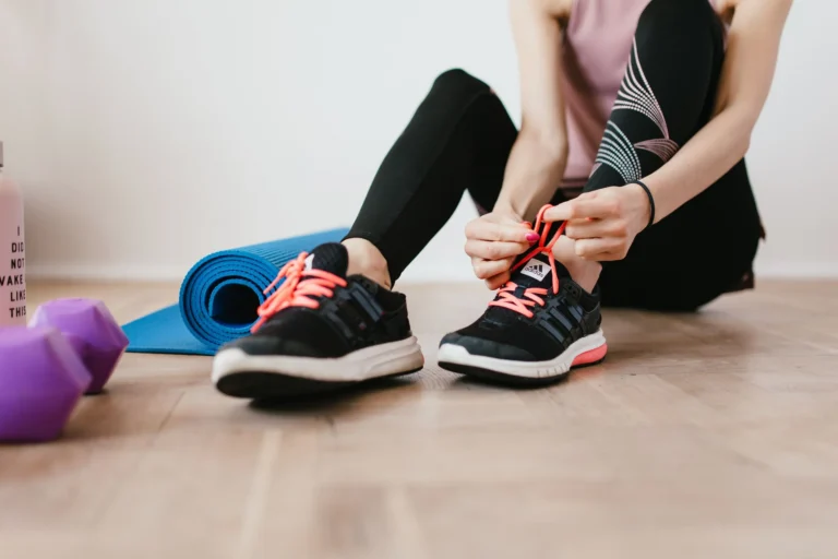 home workout – woman exercising at home without equipment for fitness