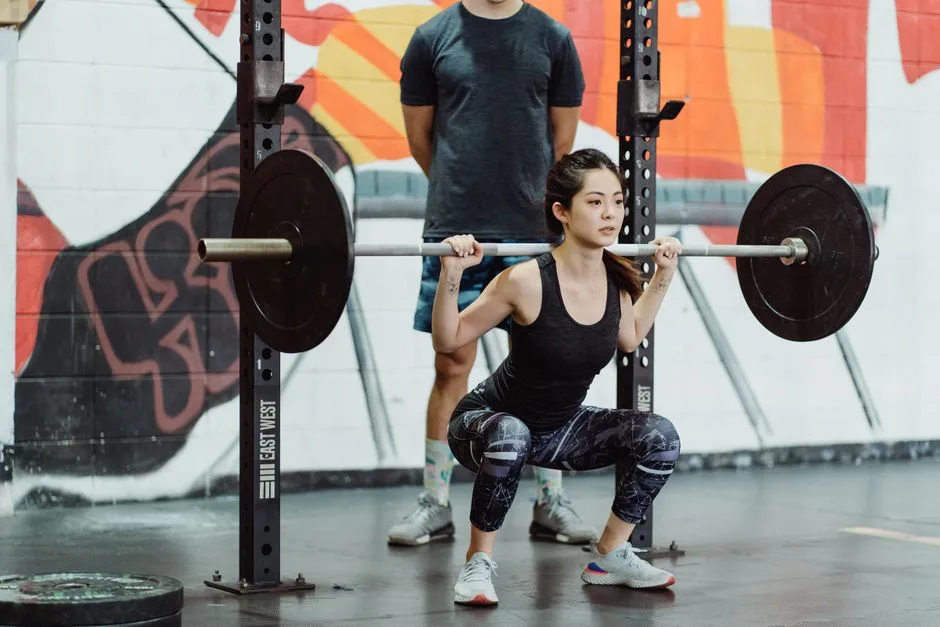 Compound vs isolation exercises: barbell squat